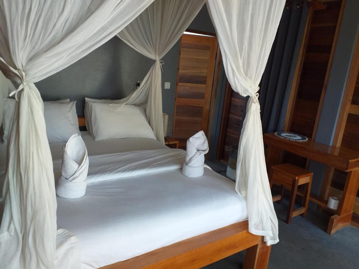 The Geckos Homestay Келимуту Номер фото